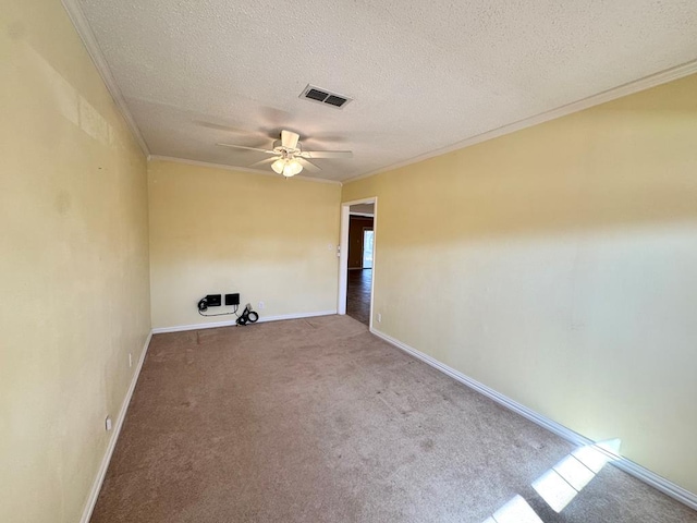 2003 N Enfield Rd, Alpine, TX 79830 - unfurnished room with crown molding, a ceiling fan, carpet floors, a textured ceiling, and baseboards