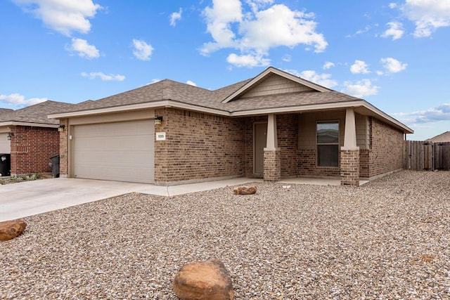 single story home featuring roof with shingles, brick siding, fence, concrete driveway, and an attached garage