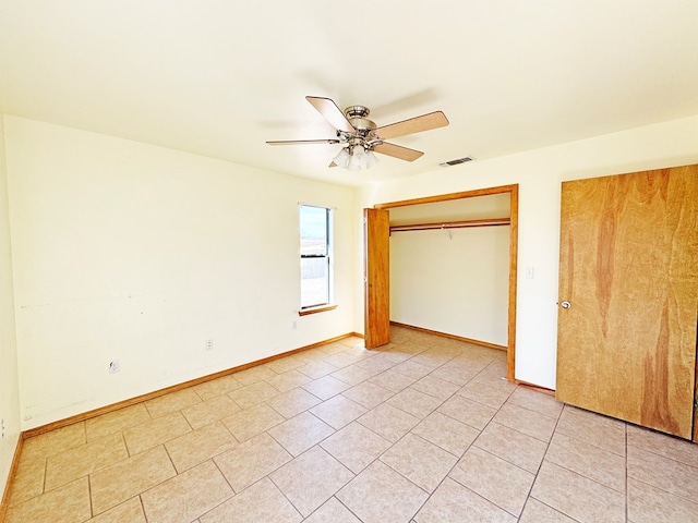 1106 W Eagle Pass, Alpine, TX 79830 - unfurnished bedroom featuring light tile patterned flooring, baseboards, and ceiling fan