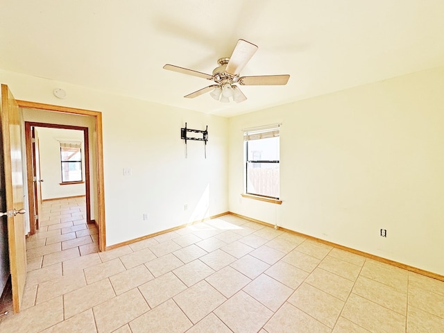 1106 W Eagle Pass, Alpine, TX 79830 - spare room featuring plenty of natural light, light tile patterned floors, and baseboards