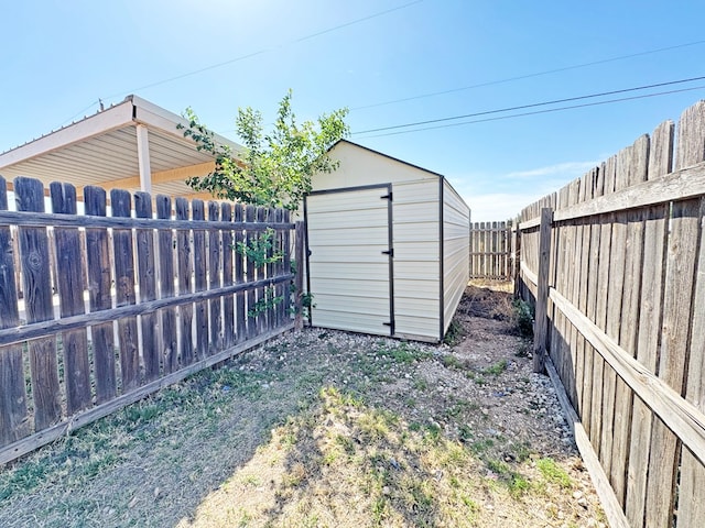 1106 W Eagle Pass, Alpine, TX 79830 - view of shed featuring a fenced backyard