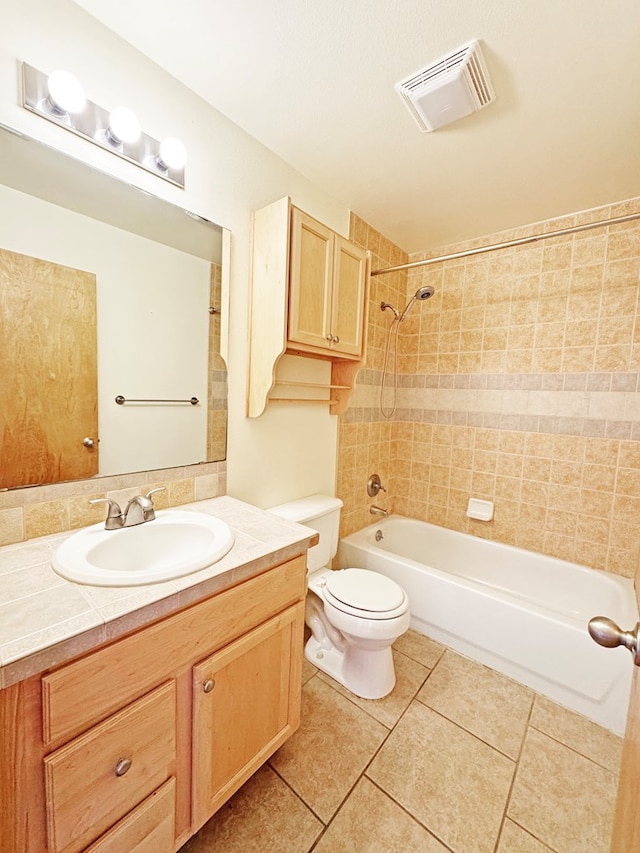 1106 W Eagle Pass, Alpine, TX 79830 - bathroom with tile patterned flooring, toilet, vanity, and shower / bathtub combination