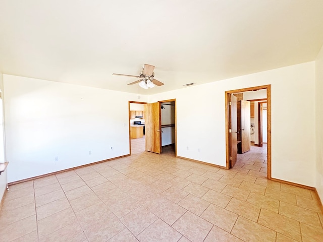 1106 W Eagle Pass, Alpine, TX 79830 - unfurnished room with baseboards, ceiling fan, and light tile patterned floors