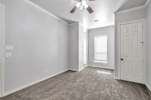 3 E Wavyleaf Ct, Odessa, TX 79762 - carpeted spare room featuring ornamental molding, ceiling fan, baseboards, and a textured ceiling