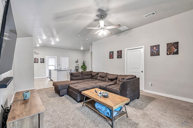 1320 E 94th St, Odessa, TX 79765 - living room featuring ceiling fan, light carpet, and vaulted ceiling