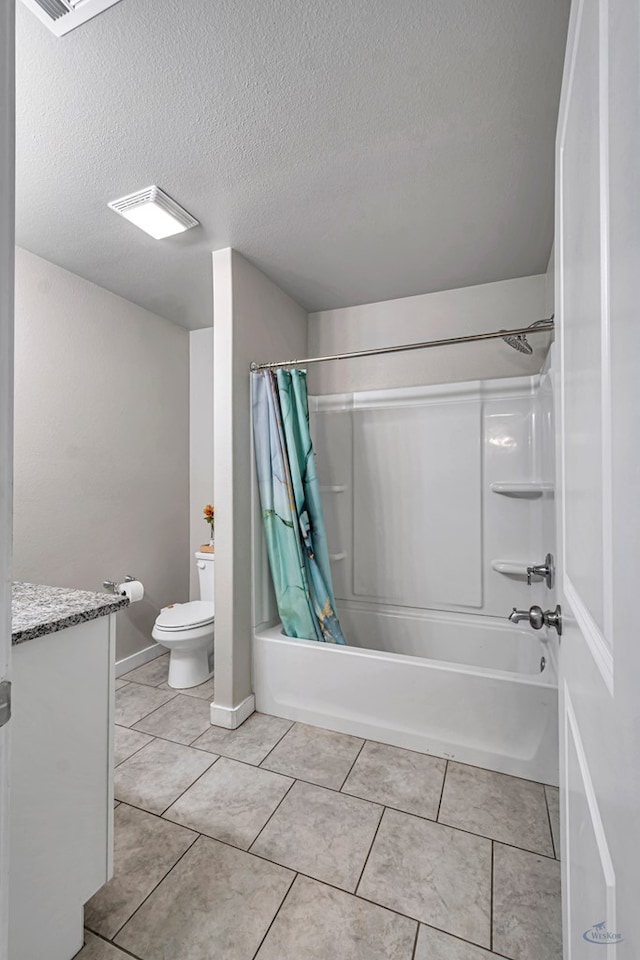 1320 E 94th St, Odessa, TX 79765 - bathroom featuring shower / tub combo, vanity, a textured ceiling, and tile patterned floors