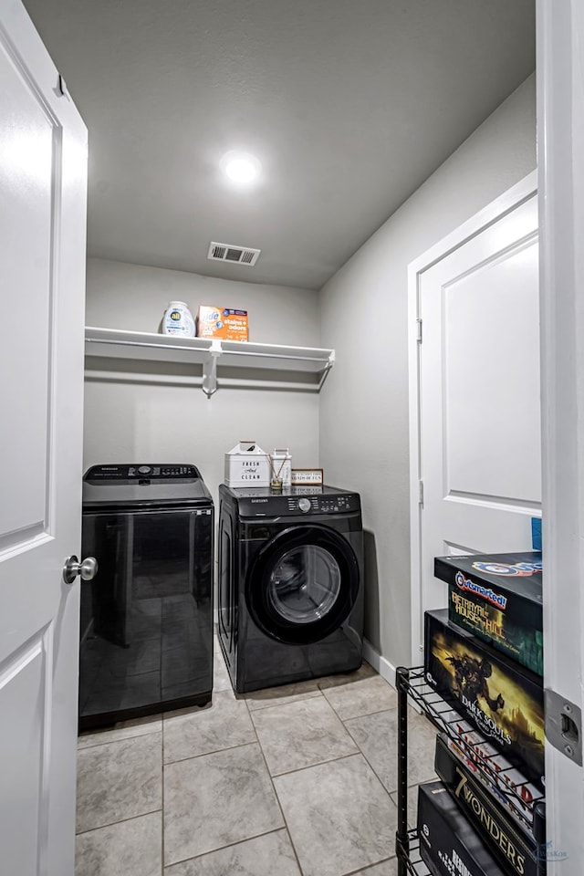 1320 E 94th St, Odessa, TX 79765 - washroom with independent washer and dryer and tile patterned flooring