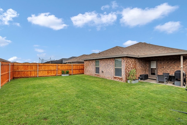 1320 E 94th St, Odessa, TX 79765 - fenced backyard with a patio