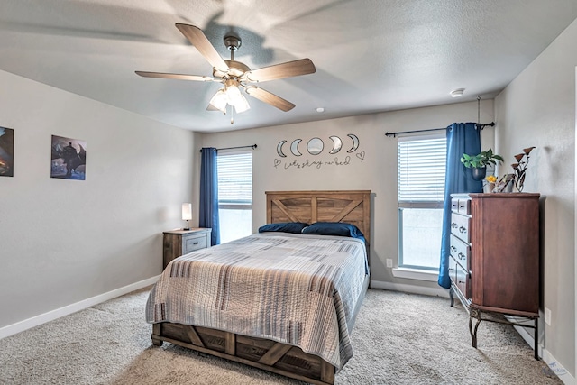 1320 E 94th St, Odessa, TX 79765 - carpeted bedroom featuring baseboards and a ceiling fan