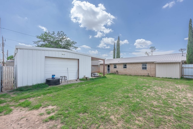 1714 E 53rd St, Odessa, TX 79762 - back of property with a garage and an outbuilding