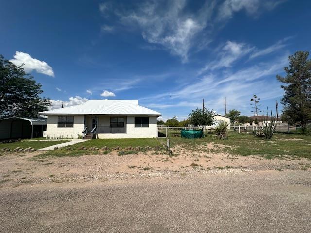 1013 Peachtree Cir, Alpine, TX 79830 - view of front facade featuring a detached carport