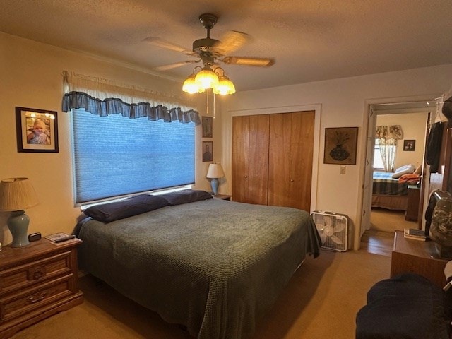 1013 Peachtree Cir, Alpine, TX 79830 - bedroom with a closet and ceiling fan
