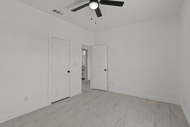 12645 W Maria Dr, Odessa, TX 79764 - unfurnished room with a ceiling fan and baseboards