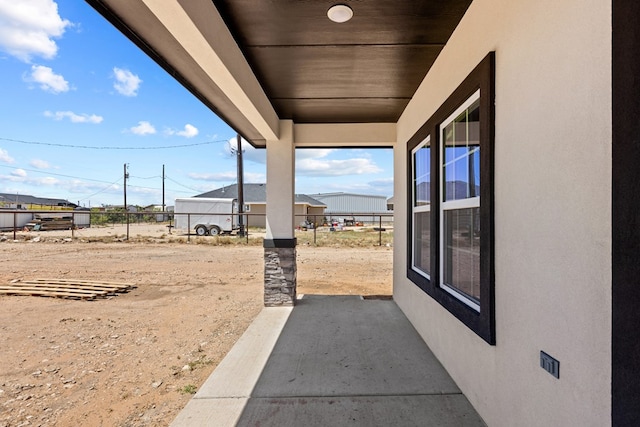 view of patio with fence