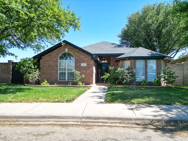 10 Lafayette Pl, Odessa, TX 79762 - single story home with brick siding and a front yard