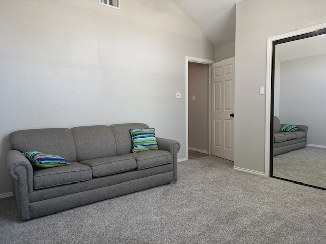10 Lafayette Pl, Odessa, TX 79762 - living area featuring carpet flooring, lofted ceiling, and baseboards