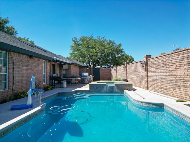 10 Lafayette Pl, Odessa, TX 79762 - view of pool with a patio, a fenced backyard, and a pool with connected hot tub