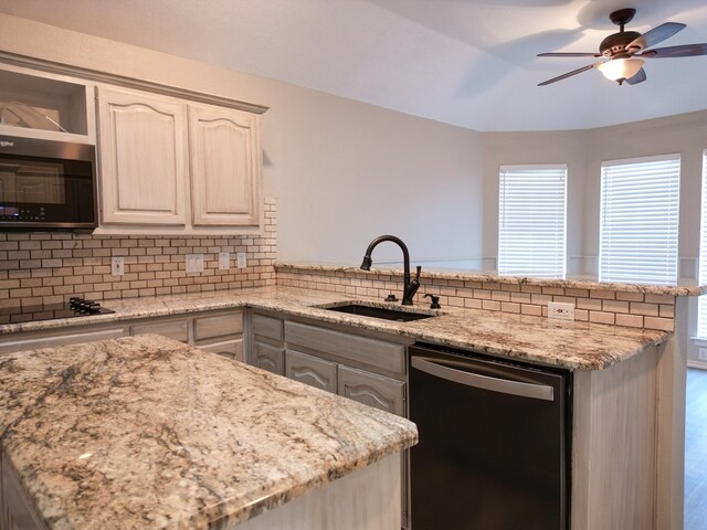 10 Lafayette Pl, Odessa, TX 79762 - kitchen with dishwashing machine, stainless steel microwave, a peninsula, a sink, and black electric cooktop