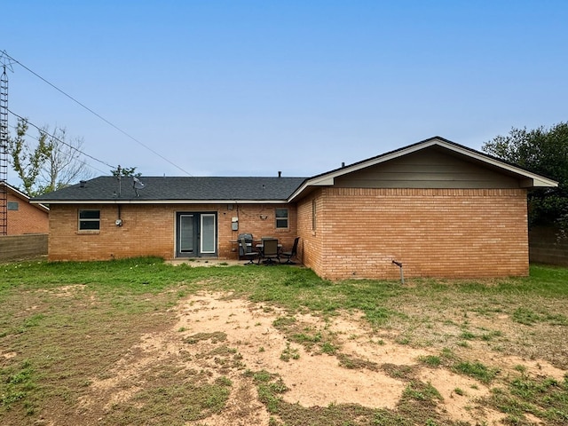 111 N 24th St, Lamesa, TX 79331 - rear view of house featuring brick siding