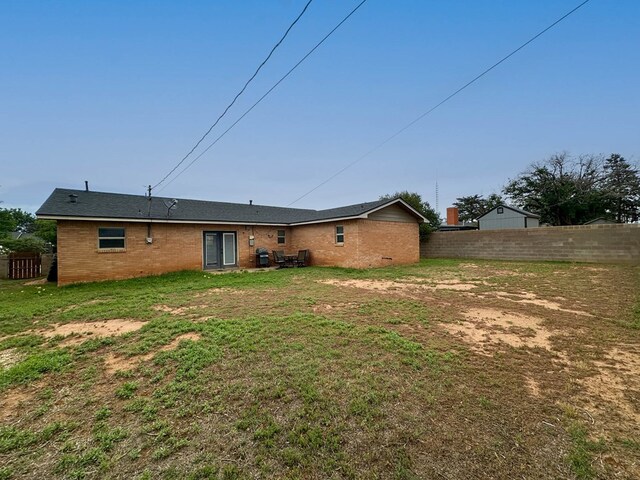 111 N 24th St, Lamesa, TX 79331 - back of house with brick siding