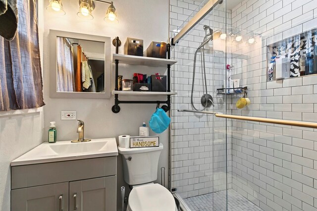 811 NW 7th St, Andrews, TX 79714 - full bath with vanity, toilet, and a shower stall