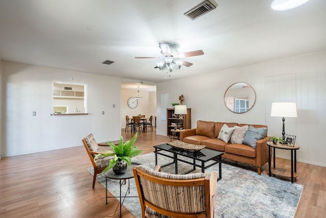 1403 E 17th St, Odessa, TX 79761 - living area with a ceiling fan and wood finished floors