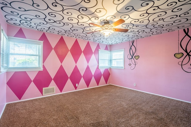 1403 E 17th St, Odessa, TX 79761 - carpeted empty room featuring a ceiling fan and baseboards
