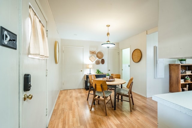 1403 E 17th St, Odessa, TX 79761 - dining space featuring light wood-type flooring and baseboards