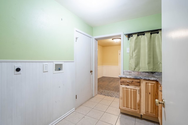 1403 E 17th St, Odessa, TX 79761 - full bathroom featuring wainscoting, tile patterned flooring, and vanity