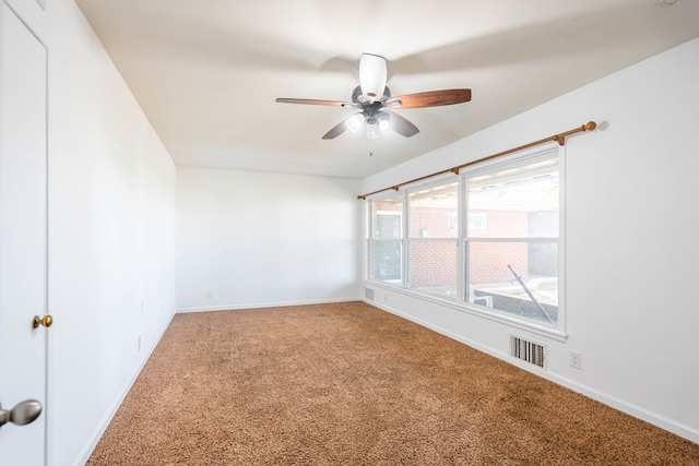 1403 E 17th St, Odessa, TX 79761 - carpeted spare room featuring ceiling fan and baseboards