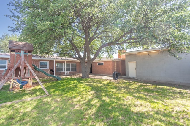 1403 E 17th St, Odessa, TX 79761 - view of green lawn with a playground