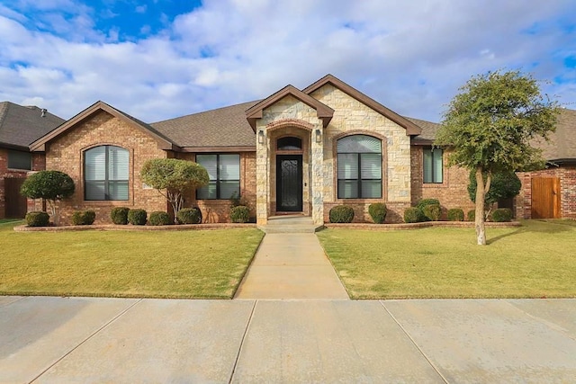 view of front of home with a front lawn