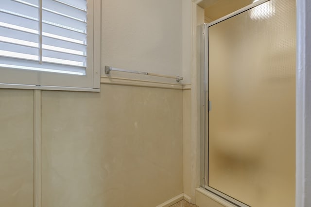 bathroom with a stall shower