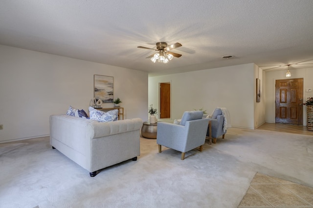 living room featuring light colored carpet and ceiling fan