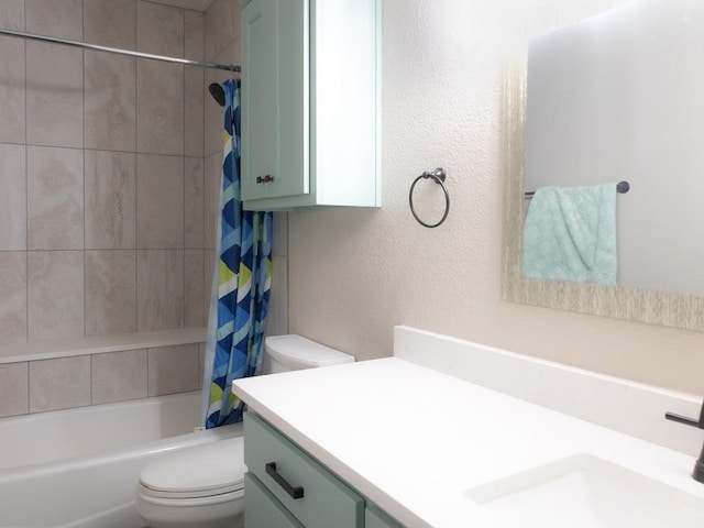 full bathroom featuring toilet, shower / bath combination with curtain, and vanity