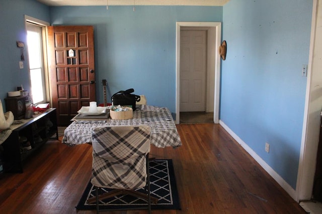 2711 W 83rd St, Odessa, TX 79764 - dining space featuring dark wood-style floors and baseboards