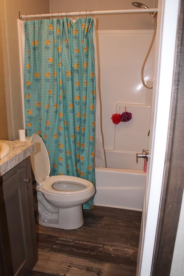2711 W 83rd St, Odessa, TX 79764 - bathroom with wood finished floors, vanity, and shower / bath combo