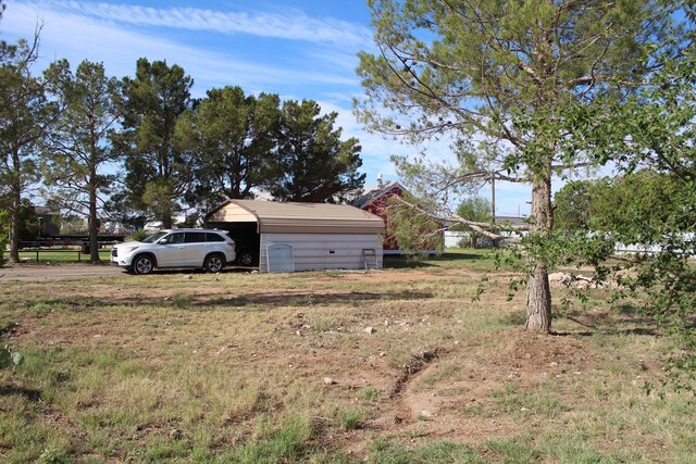 2711 W 83rd St, Odessa, TX 79764 - view of yard with an outbuilding