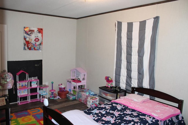 2711 W 83rd St, Odessa, TX 79764 - bedroom featuring ornamental molding and wood finished floors