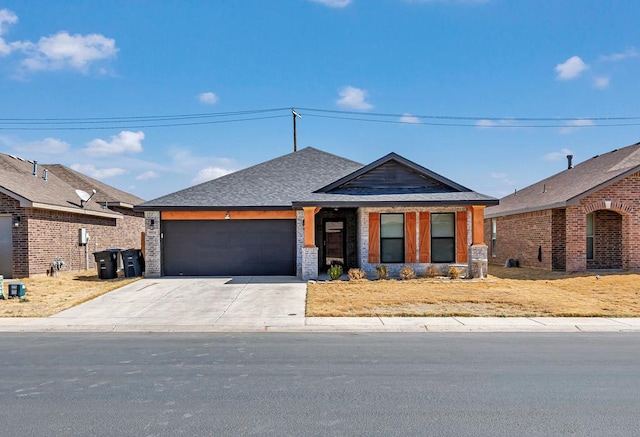 ranch-style home featuring an attached garage, concrete driveway, brick siding, and a shingled roof