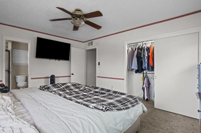 2110 Redbud Ave, Odessa, TX 79761 - bedroom with carpet, a textured ceiling, a closet, ornamental molding, and a ceiling fan