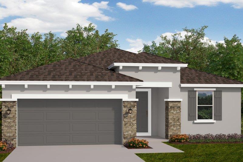 707 S Bruce Ave, Monahans, TX 79756 - view of front of house with stone siding, roof with shingles, stucco siding, driveway, and a garage