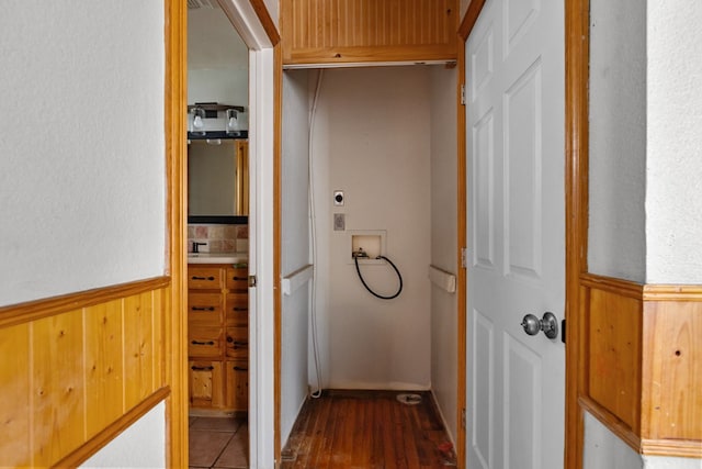 1306 Woodlawn Dr, Odessa, TX 79761 - hallway with wainscoting, wood finished floors, and wood walls