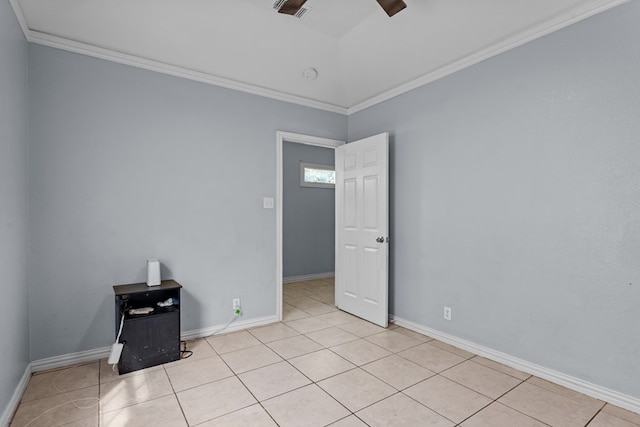 1306 Woodlawn Dr, Odessa, TX 79761 - spare room featuring ceiling fan, ornamental molding, and light tile patterned floors