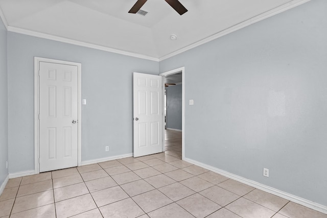 1306 Woodlawn Dr, Odessa, TX 79761 - spare room with a ceiling fan, light tile patterned flooring, ornamental molding, and a smoke detector