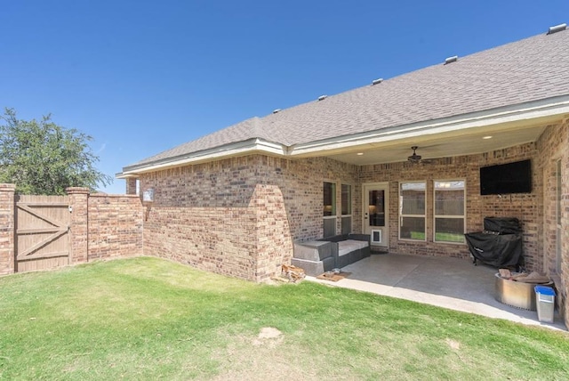 4402 Guadalupe, Midland, TX 79707 - view of yard with a gate, a ceiling fan, and a patio area