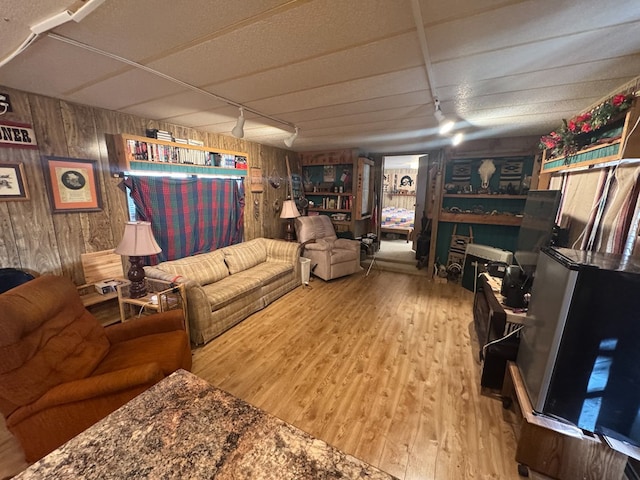303 Squaw Valley Trl, Fort Davis, TX 79734 - living area featuring wood finished floors and wood walls