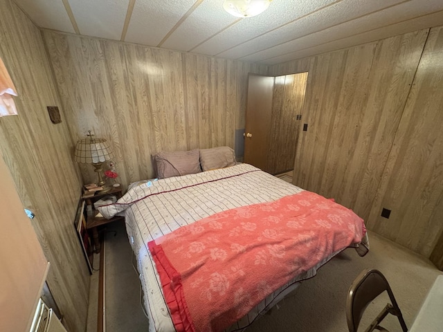 303 Squaw Valley Trl, Fort Davis, TX 79734 - bedroom featuring carpet and wooden walls