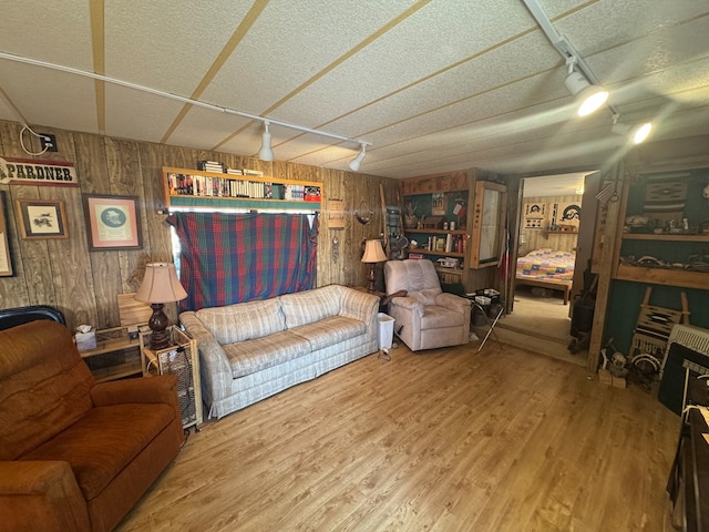 303 Squaw Valley Trl, Fort Davis, TX 79734 - living area with wood walls and wood finished floors