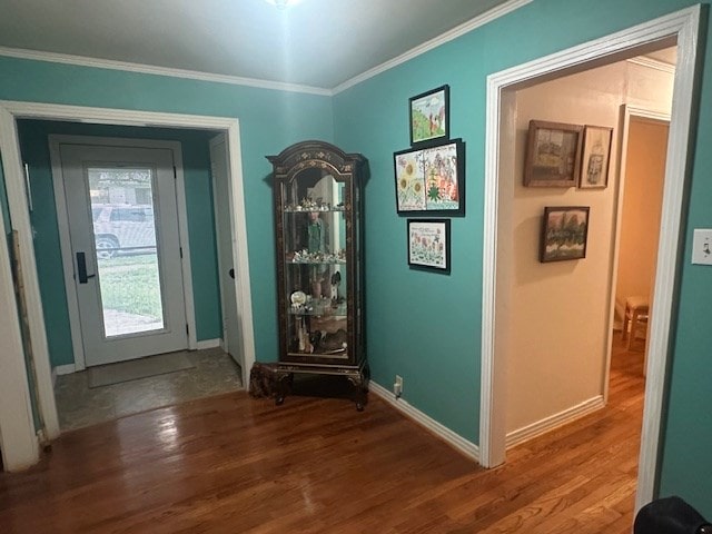 407 N Phelps St, Alpine, TX 79830 - hallway with crown molding, wood finished floors, and baseboards